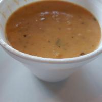 Roasted Tomato Garlic Soup · Served with a garlic mini-loaf