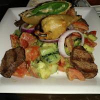 Bistro Steak Salad with Jalapeno Popper · Diced tomato, cucumber, avocado and red onion tossed with cilantro and mint in a lime olive ...