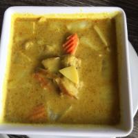 Yellow Curry · Mild spicy yellow curry with coconut milk , potatoes, onions, carrots, herbs and spices. Wit...