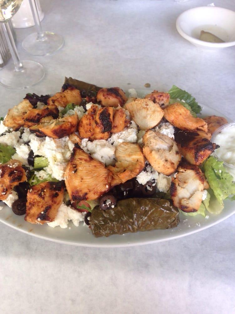 Greek Salad · Romaine lettuce, tomatoes, Bulgarian cheese, cucumbers & olive oil