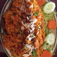 Chicken Biryani · Aromatic basmati rice mixed with boneless chicken, cooked with delicately spiced including s...