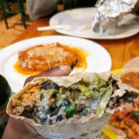 Super Burrito · Meat, beans, rice, meat, cheese, guacamole, sour cream, lettuce, tomato and salsa.