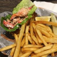 The Real Lobster Roll · 100% real Maine lobster meat, mayo, lemon, celery on a New England roll.