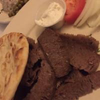 Gyros Plate · Served with onion, tomatoes, pita bread and tzatziki sauce. Served with rice and potatoes.