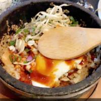 Seafood Stone Bowl · Sizzling rice served in a hot stone bowl with variety of seafood and Katana oyster sauce.