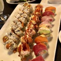 Katana 101 Roll · (Spicy) Salmon, cream cheese, avocado, jalapeno topped with crabmeat, spicy tuna, eel sauce,...