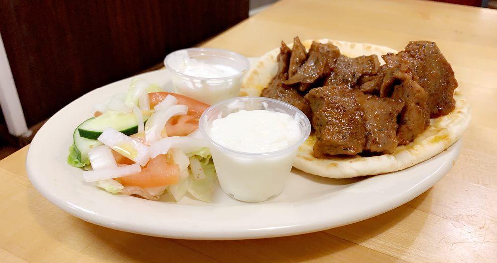 Spicy Gyro Sandwich · Lamb and beef broiled on a rotisserie served in a pita beard.