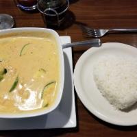 Panang Curry · Served meat cooked with bell pepper grapes kaffir lime, coconut milk in panang curry paste.