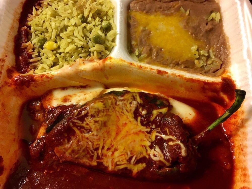 Chile Relleno · Stuffed poblano pepper filled with cheese. Topped with a red, green or creamy jalapeno sauce and served with rice and beans.