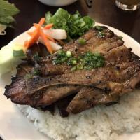 Grilled Pork Chop on Rice · 