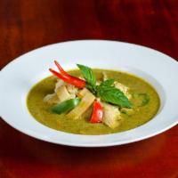 Green Curry · Green curry paste with coconut milk, bamboo shoots, bell pepper, basil, and eggplant.