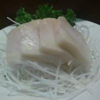 Super White Tuna Nigiri · Sushi laid top of rice.