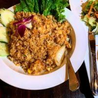 Crab Fried Rice · Thai style fried rice with crab, onions, tomatoes and egg.