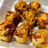 Missouri Roll · Spicy tuna, avocado, deep fried and topped with mixed crabmeat, spicy mayo and eel sauce. Sp...