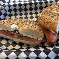 Lox Deluxe Bagel Sandwich · Choice of bagel topped with schmear, nova lox, tomato, onion and capers.