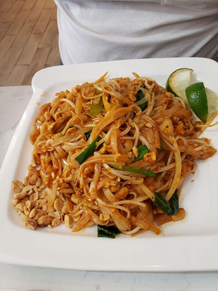 Pad Thai · Stir-fried Thai rice noodle with peanut bean sprout, scallion and lime