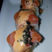 Black Widow Roll · Spicy crabmeat, asparagus and avocado topped with tuna, salmon and black caviar with mr. Smi...