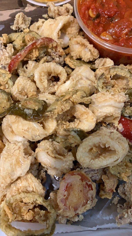 Fried Calamari · with Fried cherry peppers. Choice of lemon aioli or marinara. Both sauces for additional $1.50