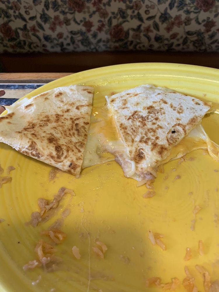 Quesadilla · Large flour tortilla filled with melted cheese and your choice of 1 protein. Topped with tomatoes, onions, guacamole, sour cream and olives.