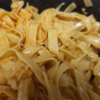 Garlic Noodles · Flat egg noodles served with garlic and soy sauce.