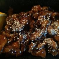 Sesame Chicken · Breaded deep fried chicken tossed with house special honey soy sauce topped with sesame and ...
