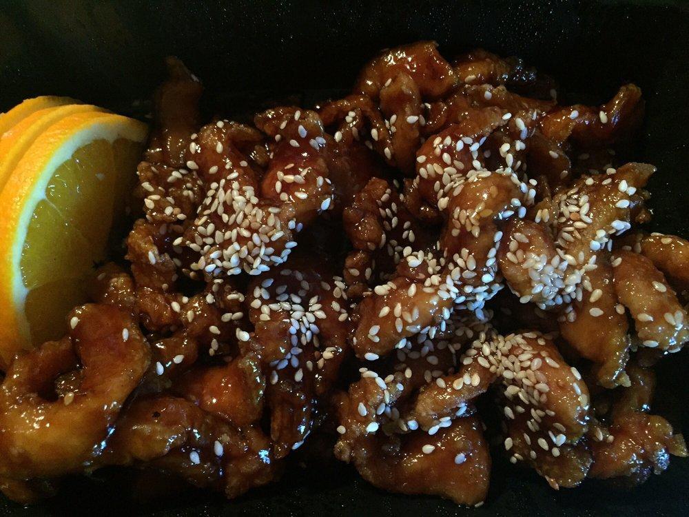 Sesame Chicken · Breaded deep fried chicken tossed with house special honey soy sauce topped with sesame and green onions. (cannot be gluten free)