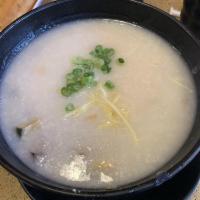 Dry Oyster and Pork with Preserved Egg Congee · 