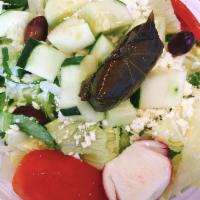 Greek Salad · Fresh mixed greens, grated feta cheese, tomato, cucumber, olives, peppers, pepperoncini and ...