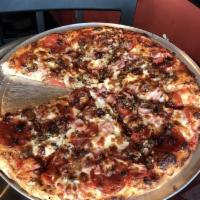 Meat Lovers Pizza · Pepperoni, sausage, ham, meatballs, bacon and salami.