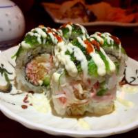 Dragon Roll · Tuna, marinated crab stick, cucumber (eel and avocado, masago on the top).