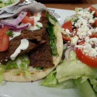 Greek Salad · Romaine lettuce, cucumber, tomato, onions, red and green bell peppers, onions, pita chips, s...