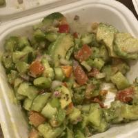 Avocado Salad · Sliced avocado, red onions, bell peppers, cucumbers, tomatoes, cilantro, and homemade dressi...
