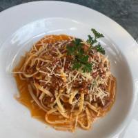 Spaghetti · Tossed with fresh garlic and our homemade marinara or meat sauce.