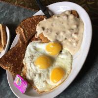 Country Fried Steak and Eggs · Served with 2 eggs, hash browns or fruit and toast.
