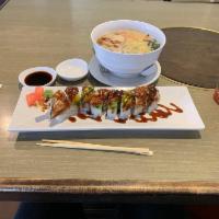 Dragon Roll · Shrimp tempura & crab topped with unagi & avocado.