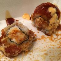 Red Dragon Roll · Shrimp tempura & spicy crab topped with spicy tuna, unagi sauce, spicy mayo and crunchies. S...