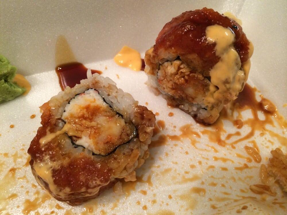 Red Dragon Roll · Shrimp tempura & spicy crab topped with spicy tuna, unagi sauce, spicy mayo and crunchies. Spicy.