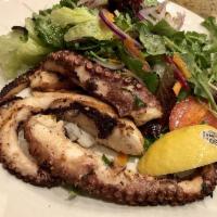 Grilled Octopus · Cooked on a rack over a grill. 