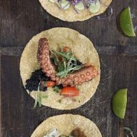 Wood Grilled Kanpachi Taco · Wood grilled Premium Omega Blue Baja Kanpachi (may substitute with other high quality fish d...