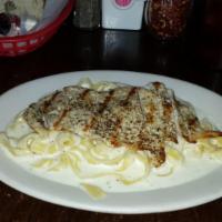 Fettuccine Alfredo · Add grilled chicken for an additional charge.