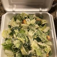 Caesar Salad · Romaine lettuce, Parmigiana cheese, Caesar dressing and
croutons. Add grilled chicken for an...
