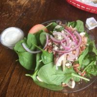 Spinach Salad · Fresh spinach, gorgonzola cheese, bacon, mushrooms, red
 onions and tomato.