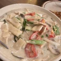Kang Keo Wan · Thai green curry with mushrooms, bamboo shoots, red bell peppers, zucchini, onions and Thai ...