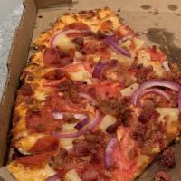 Maui Zaui Pizza · Ham, mini pepperoni or chicken with bacon, pineapple, tomatoes and red and green onions on t...