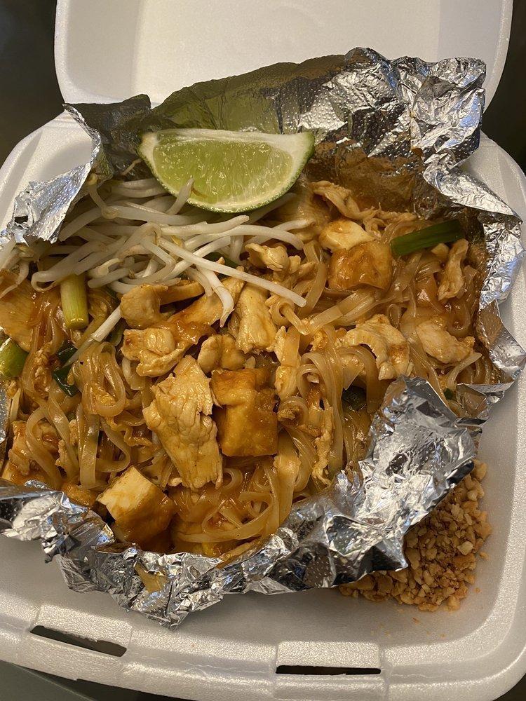 Pad Thai · Thai style pan-fired thin rice noodle with eggs, tofu, bean sprouts, green onions, fresh lime and ground peanuts.