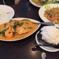 Pumpkin Curry · Creamy red curry sauce come with chicken and shrimp, bell peppers, Thai basil and coconut mi...