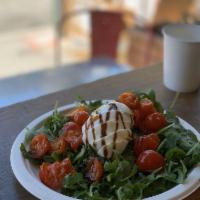 Mozzarella Salad · Served with lettuce, cherry tomatoes, and carrots. Serves four.

Please be aware that all ca...