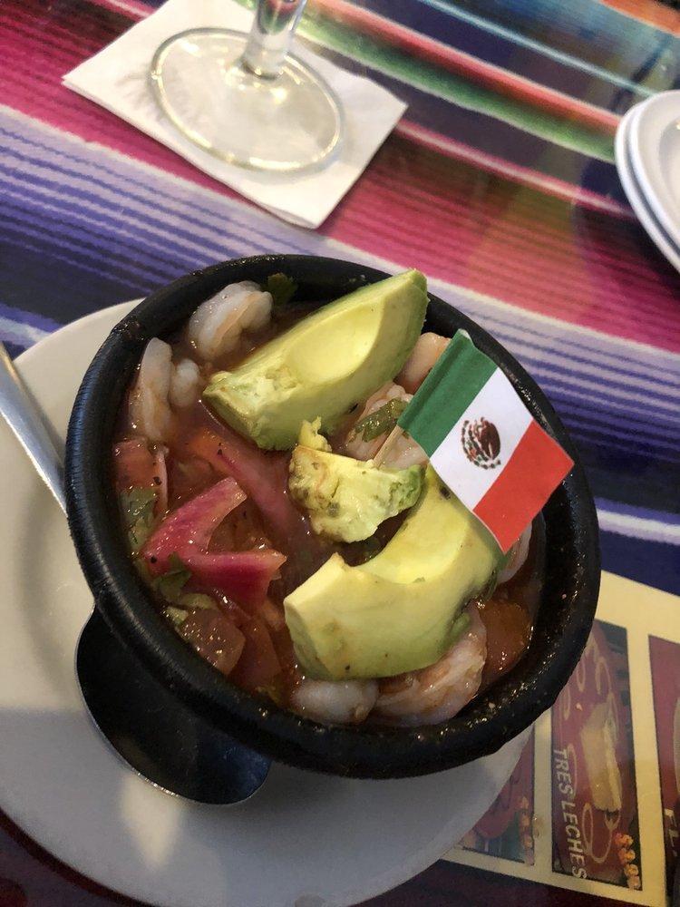 Ceviche · Shrimp marinated in fresh lime and lemon juice, tomatoes, onions, and cilantro. Garnished with sliced avocado. Hot or extra hot at your request.