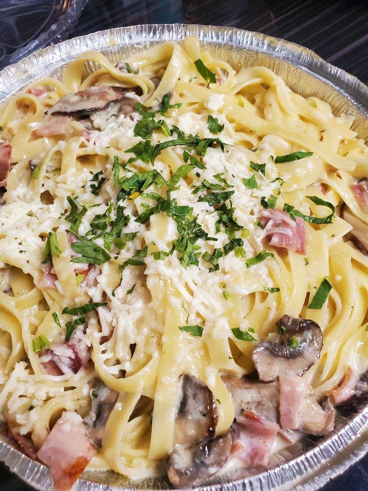 Pasta Carbonara · Prosciutto italian ham, portabella mushrooms, and fresh garlic simmered in alfredo and tossed with your choice of noodle