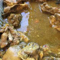 Curry Chicken · Whole chicken seasoned with Jamaican curry and herbs and spices then stewed until tender.